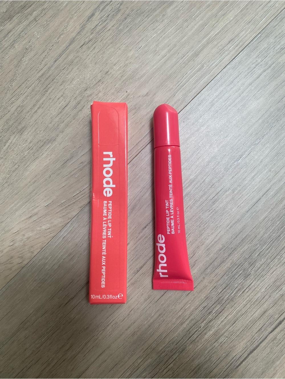 Rhode Peptide Lip Tint in guava spritz